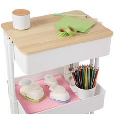 a wooden table with two drawers on it and various office supplies in the bottom drawer