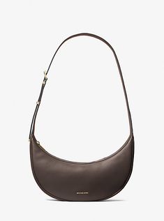 Our Avra bag just might be the chicest way to carry your daily essentials. It’s made from smooth leather in a crescent shape with a buckled strap that can be adjusted to your desired length. The slim profile makes it well suited for any number of occasions. Crescent Shape, Daily Essentials, Leather Crossbody Bag, Smooth Leather, Cross Body Handbags, Leather Crossbody, Crescent, Mini Bag, Leather Bag