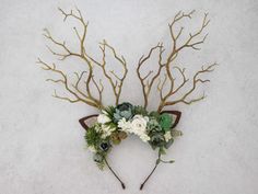 This beautiful antler headband is a lovely accessory, perfect for a party or photo-shooting session. Our stunning faux flowers look like the real. Head circumference:  one size fits all (adjustable) / fits adults Forest Crown, Faun Costume, Fall Photo Props, Antler Headband, Fall Photo, Floral Headpiece, Deer Antler, Deer Antlers, Head Band