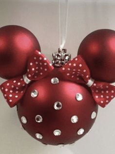 a minnie mouse ornament hanging on a wall