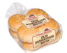 four bagels in plastic wrapper on white background