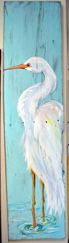 a painting of a white egret standing in water