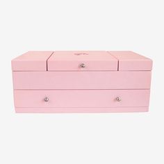 a pink chest with two drawers on top