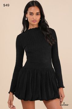 Let all the cuties know you mean business in the Lulus Approachably Adorable Black Ribbed Bubble-Hem Mini Dress! Lightweight knit fabric, with a subtle ribbed design, shapes long sleeves and a mock neckline, with adorable lettuce-edge trim throughout. Fitted bodice continues down to a drop waist and a flaring, bubble-style skirt with a mini hem. Fit: This garment fits true to size. Length: Mid-thigh. Size medium measures 33.5" from shoulder to hem. Bust: Great for any cup size. Waist: Fitted - s Cute Dresses Long, Long Sleeve Dresses Fall, Dinner Party Dress, Casual Wedding Guest Dresses, Design Shapes, Black And Blue Dress, Casual Formal Dresses, Mini Dress Long Sleeve, Bubble Style