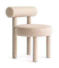 a white chair that is made out of concrete and has a circular seat on the back