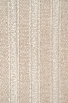 an upholstered beige and white striped wallpaper with vertical lines in the center