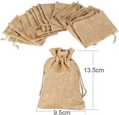 six bags with draws are shown on the bottom and one bag is filled with linen