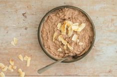 a bowl of oatmeal with banana peels on top