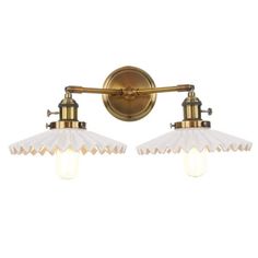 two light bathroom fixture with an antique brass finish and frosted glass shades on the bulbs