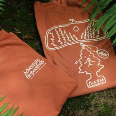 We’re extremely excited to announce that we are now officially partners in national park protection with the National Parks Conservation Association (NPCA). So excited in fact, that we just had to drop this fresh, outdoorsy, national-parks-inspired apparel. Shirt: Comfort Colors Adult Heavyweight Tee, "Yam". Shirts run slightly larger/roomier than your average T-Shirt. Pre-shrunk during the garment dye for no shrinkage at home. Design: T-Shirts skillfully hand-printed by Aardvark Screenprinting Outdoor Apparel Photography, Outdoor Tshirt Design, Granola Shirts, Camping T Shirts Ideas, Outdoorsy Branding, Camp T Shirt, Church Merch, Tshirt Style Outfit, Apparel Photography