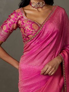 Editor's Note Elevate your traditional style with our fuchsia ari-hand-embroidered varuna sari, complete with a stitched blouse. This ensemble is perfect for special occasions, allowing you to showcase timeless elegance with intricate embroidery and the convenience of a pre-stitched blouse. Make a lasting impression at any event with this classic and sophisticated attire that combines tradition with modern comfort. Fabric: Nilambari silk with zari Color: Pink Components: Sari and blouse Occasion Balloon Hands Blouse For Saree, Hot Pink Saree, Modern Blouse Designs, Blouses Pattern, Indian Fits, Pink Blouse Designs, Zari Saree, Hot Pink Blouses, Blouse Designs Catalogue