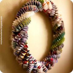 an origami wreath made out of books