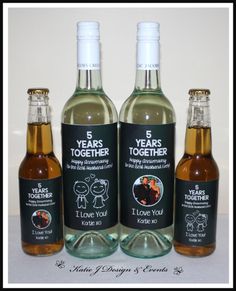 three bottles of wine with labels on them