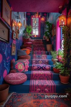 the stairs are decorated with colorful rugs and potted plants