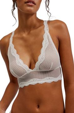 Scalloped lace and dotted mesh add a romantic feel to an unlined racerback bralette that's a perfect complement to styles with cutaway shoulders. Slips on over head Racerback 86% nylon, 14% spandex Hand wash, dry flat Imported Longline Bra, Scalloped Lace, Halter Style, Bra Lingerie, Long A Line, Lace Trim, Bralette, Boho Chic, Free People