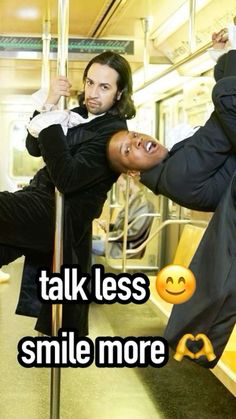 two people hanging upside down on a bus with the caption talk less smile more