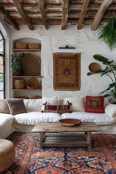 a living room filled with furniture and lots of plants on top of the wall next to a window