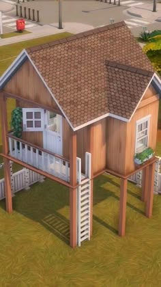 an image of a small house in the middle of a yard with stairs leading up to it