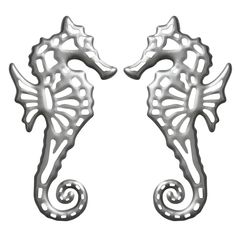 two metal seahorses are standing next to each other