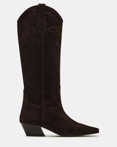 The DOLLIE Western boot offers a sleek and stylish design with a square toe. Experience comfort and durability with every step. Elevate your wardrobe with this timeless and versatile statement piece. 1.75 inch heel height Size 6 measurements: 15 inch shaft circumference, 13 inch shaft height Size 8 measurements: 16 inch shaft circumference, 14 inch shaft height Size 10 measurements: 17 inch shaft circumference, 14.75 inch shaft height Suede upper material Textile and synthetic lining Synthetic s Brown Western Boots Outfit, Long Cowboy Boots, Square Toe Boots Outfit, Western Boots Outfit, Urban Cowboy, Western Boots Women, Western Boot, Vintage Fits, Brown Brown