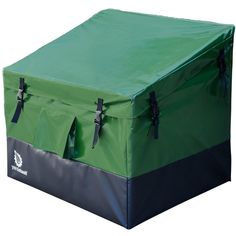 a large green and black box with straps on the top, sitting in front of a white background