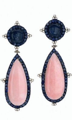 two pairs of earrings with blue and pink stones on the bottom, one has an oval shaped