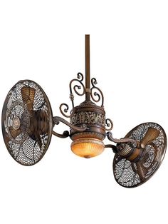 an old fashioned ceiling fan with two lights