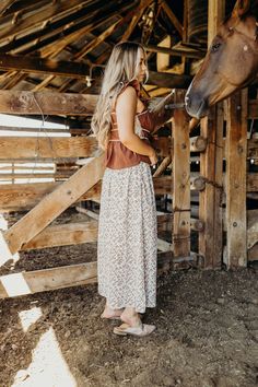 Be the envy of every outing with The Spencer Skirt! This cream floral print midi skirt features a button down front and elastic waist for comfort and style. Perfect for fall, add a touch of western flair to any outfit. Courtney is wearing size small paired with The Vita Top and The Adaire Mules Western Skirt Outfits, Outfits With Mules, The Spencer, Floral Print Midi Skirt, Printed Midi Skirt, Curvy Dress, Heritage Collection, Modest Outfits, Bottoms Pants