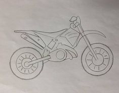 a drawing of a dirt bike on paper