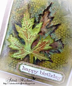 a close up of a card with a leaf on the front and bottom, which says happy birthday