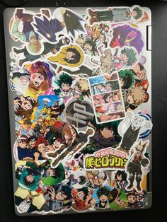 an assortment of anime stickers sitting on top of a laptop computer screen with the words,