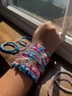 Handmade blue bracelet with heart charm Adjustable Cheerful Pink Bracelet, Playful Adjustable Pink Bracelets, Playful Pink Adjustable Bracelets, Vibrant Handmade Pink Bracelet, Pink Multi-strand Colorful Beaded Bracelets, Beachy Bracelets, Pink Beaded Bracelets, Pink Bracelet, Blue Bracelet