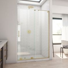 a bathroom with a walk in shower next to a white chair and window on the wall