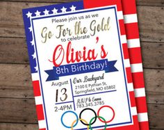 an olympic themed birthday party with red, white and blue paper on wood planks