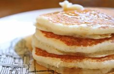 a stack of pancakes sitting on top of a plate