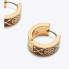 The T Monogram Hoop Earring features our signature pattern in colored enamel. Wear it with other pieces from the collection or mixed with jewelry you already own. Designer Jewellery, Designer Shoes, Tory Burch, T Monogram, Tory Burch Jewelry, Designer Jewelry, Designer Earrings, The Collection, Designing Women