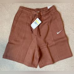 Brand: Nike Size: Women’s S Material: Body: 80% Cotton/20% Polyester; Pocket Bags: 100% Cotton Color: Mineral Clay Msrp: $45 Nwt Sporty Short Bottoms For Fall, Sporty Brown Shorts For Gym, Nike Sporty Bottoms For Fall, Casual Shorts With Pockets For Sports, Sporty Brown Athletic Shorts For Workout, Sporty Shorts For Fall, Casual Fleece Shorts For Loungewear, Sporty Brown Shorts For Spring, Casual Athletic Shorts With Pockets For Sports Season