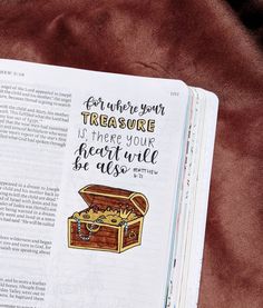 an open bible with the words for where your treasure is there you heart will be as well