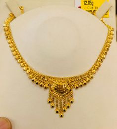 "Indian designer choker necklace , 916 Yellow Gold GOLD PURITY : pure 22k / 916 gold purity Appx Weight: 12.85 grams Length : 17\" inches Length Colour : YELLOW GOLD Hallmark: Hallmarked 916 stamp Hook: '' fish hook Design :Beautiful choker necklace indian style pendant necklace set. ( Pendant is attached to the chain ) Authentic 916 Gold FAQs Q: Is it real gold? A: yes it's real authentic genuine 916 gold Q: can pawn? A: yes it's pawnable ⭐️GoForGold⭐️ It's time to stock up gold" Choker Necklace Indian, 22k Gold Necklace, Indian Choker Necklace, Wedding Necklace Set, Beautiful Chokers, Choker Designs, Necklace Indian, Hook Design, Gold Choker Necklace