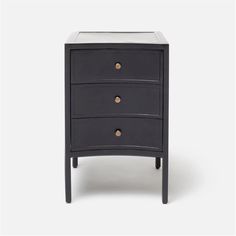 a black and white chest of drawers with three drawers on each side, one drawer has two brass knobs at the top