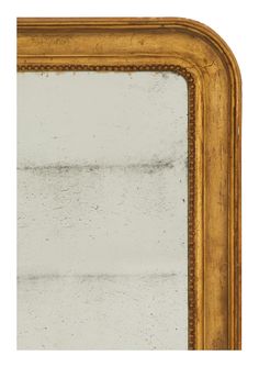 an antique gold framed mirror with beading around the edges and sides, on a white background