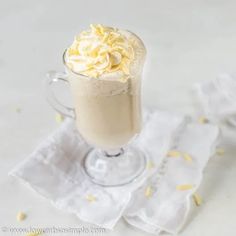 there is a drink with whipped cream on top