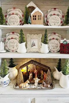 a shelf filled with christmas decorations and plates