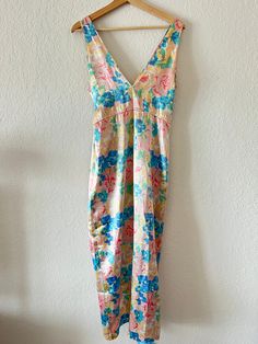 Vintage Victoria's Secret maxi dress 100% polyester Button closure on side Best fits sizes XS-S Floral Print V-neck Loungewear Dress, V-neck Lined Maxi Dress For Daywear, Summer Floral Maxi Dress For Daywear, Summer Linen Maxi Dress For Daywear, Spring Loungewear Floor-length Dress, Spring Floor-length Loungewear Dress, Floor-length Spring Loungewear Dress, Summer Maxi Dress With Buttons For Daywear, Floral Print Maxi Dress For Daywear