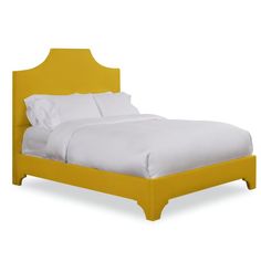 a yellow bed frame with white sheets and pillows on top of it, against a white background