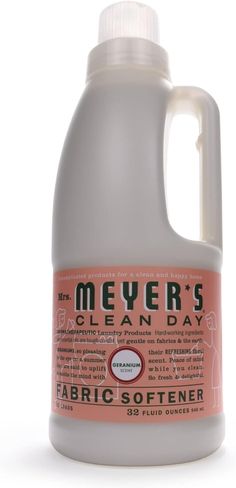 a gallon of cleaner's clean day fabric softener sitting on a white surface