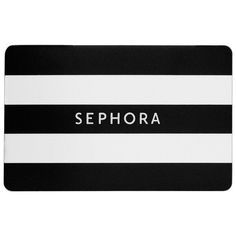 a black and white striped place mat with the word sephora in bold font on it