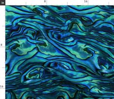 an image of blue and green marbled paper with white lines on the bottom half