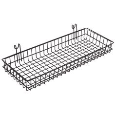 a black wire basket with scissors on the bottom and two handles for each side,