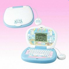 an electronic toy with a hello kitty keyboard and mouse on it's back cover